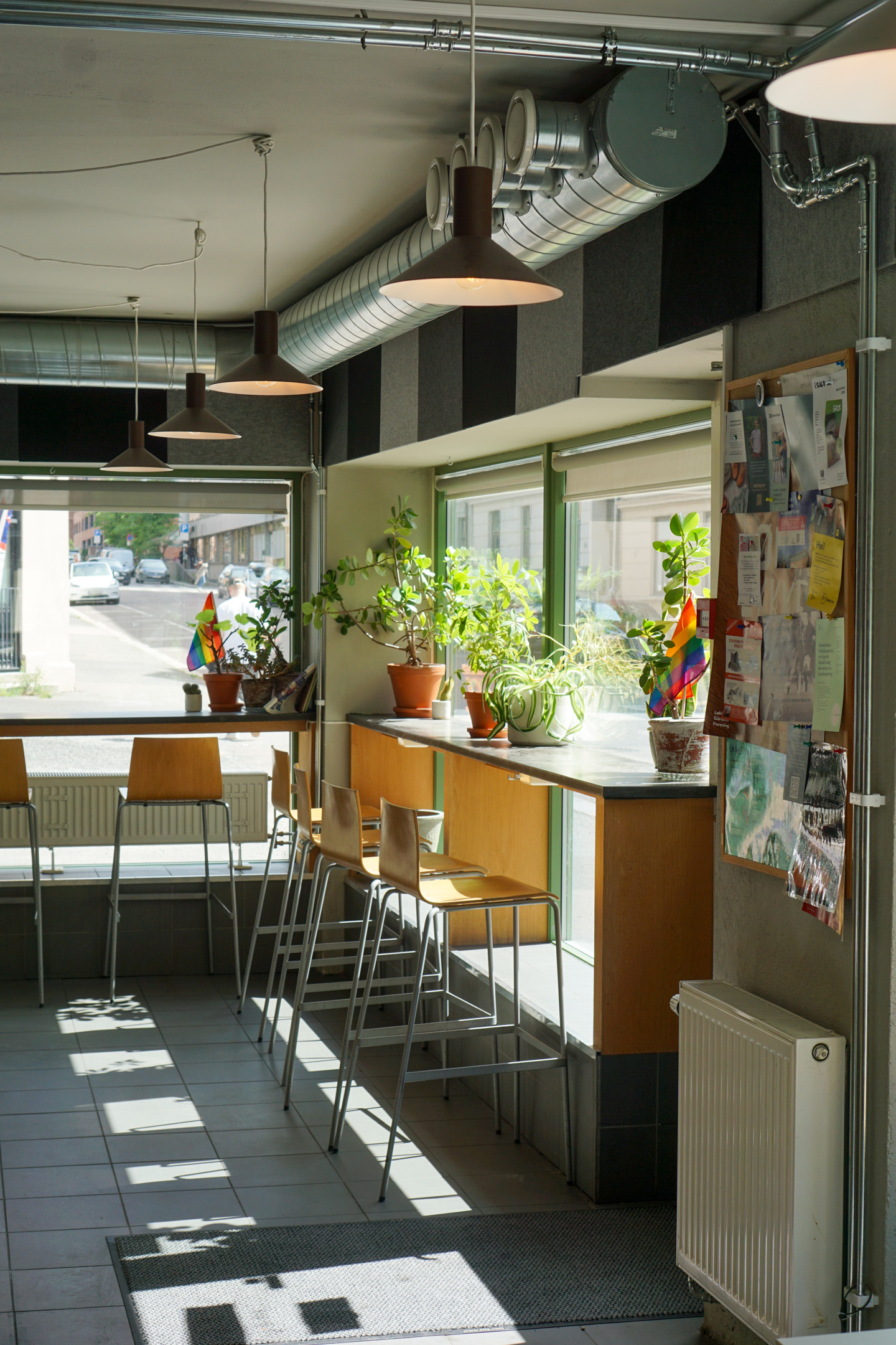 Seats along large windows facing the street