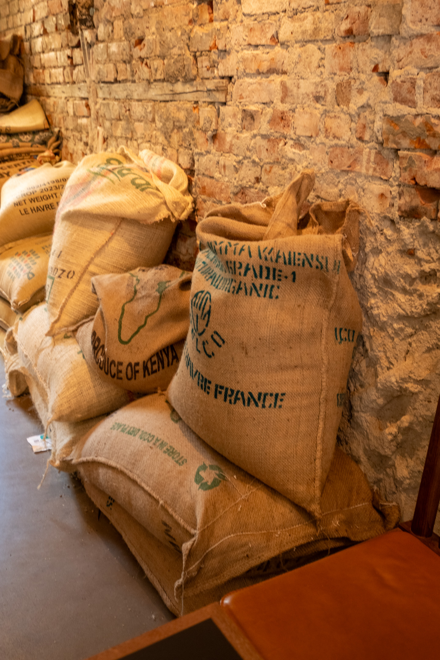 Bags of fresh coffee beans waiting to be roasted