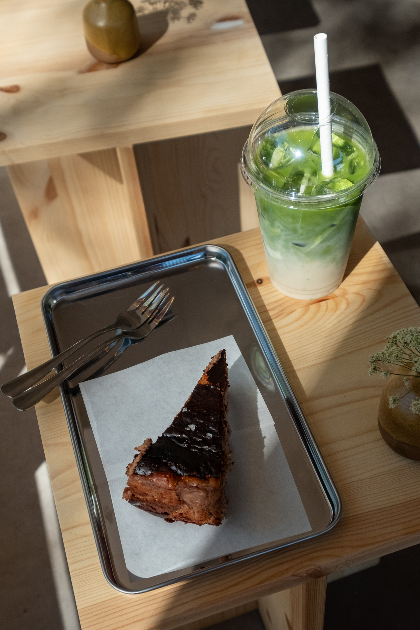 Burnt basque chocolate cheesecake with iced matcha latte